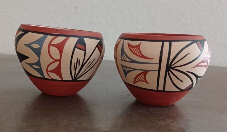 a bowl and vase made of clay