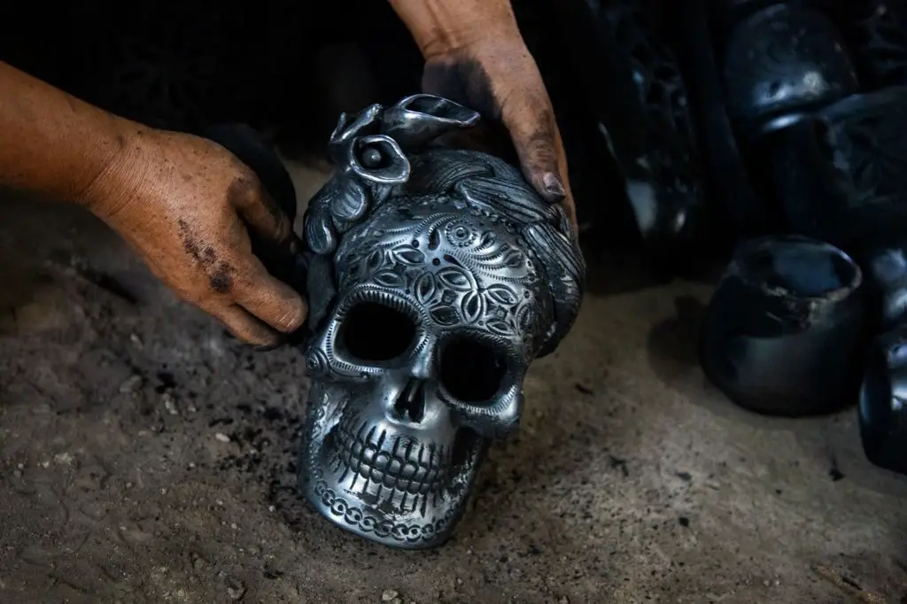 a ceramic jar made with black clay native to oaxaca, mexico.