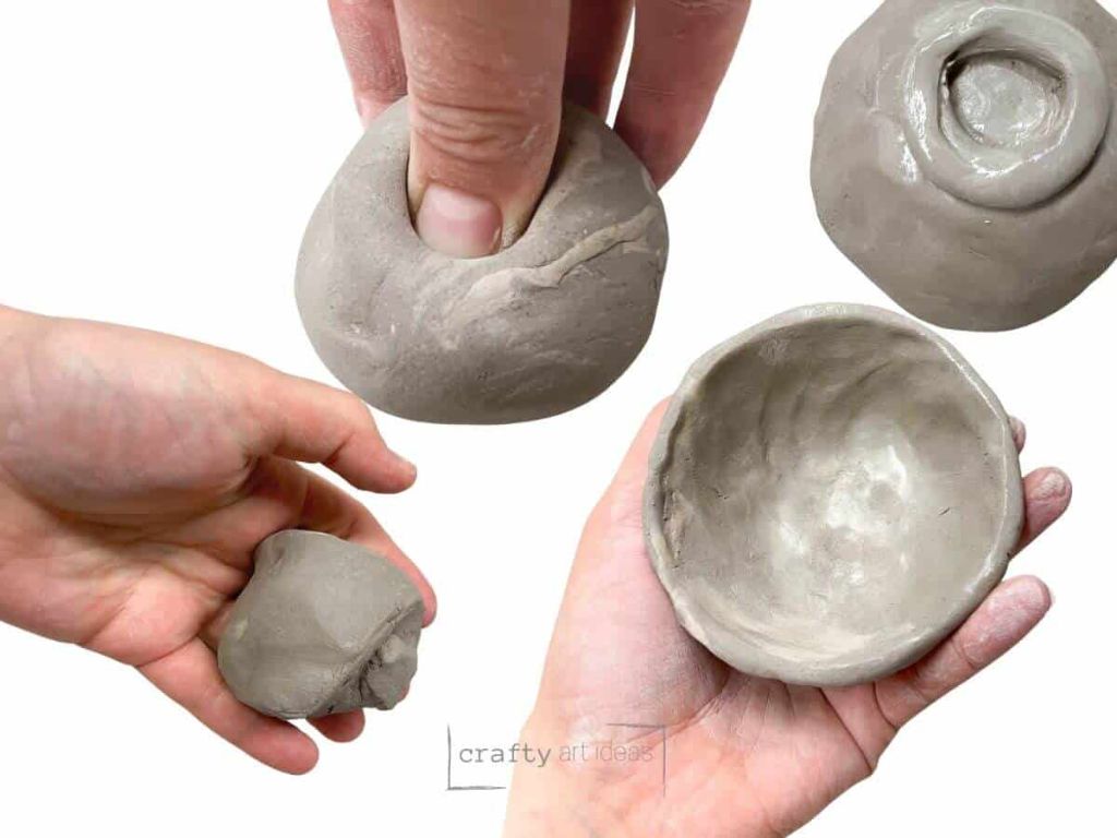 a child shaping a small clay pot using the pinch pot technique.