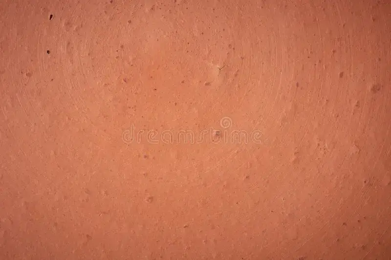a close up photo showing the porous texture of terracotta clay.