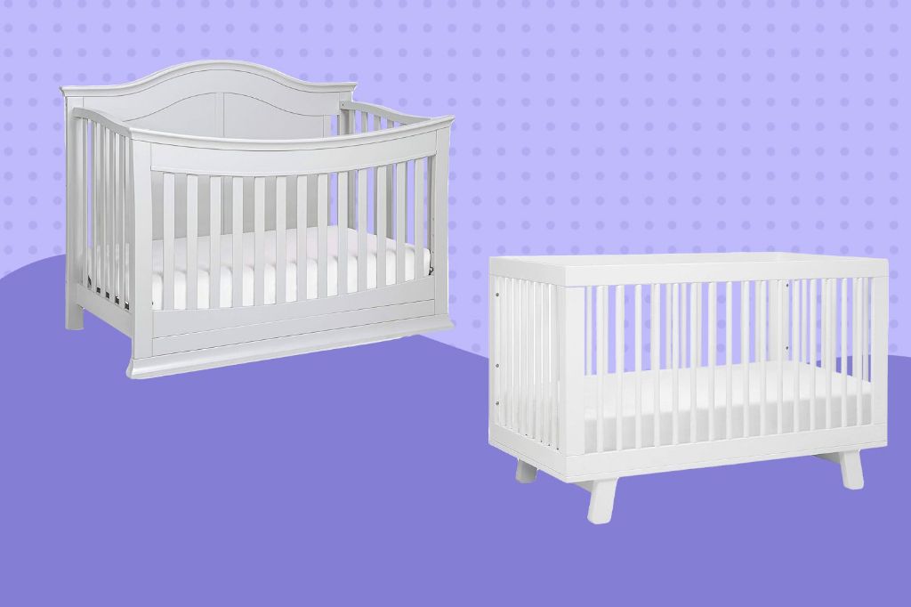 a low profile crib next to a standard crib for height comparison