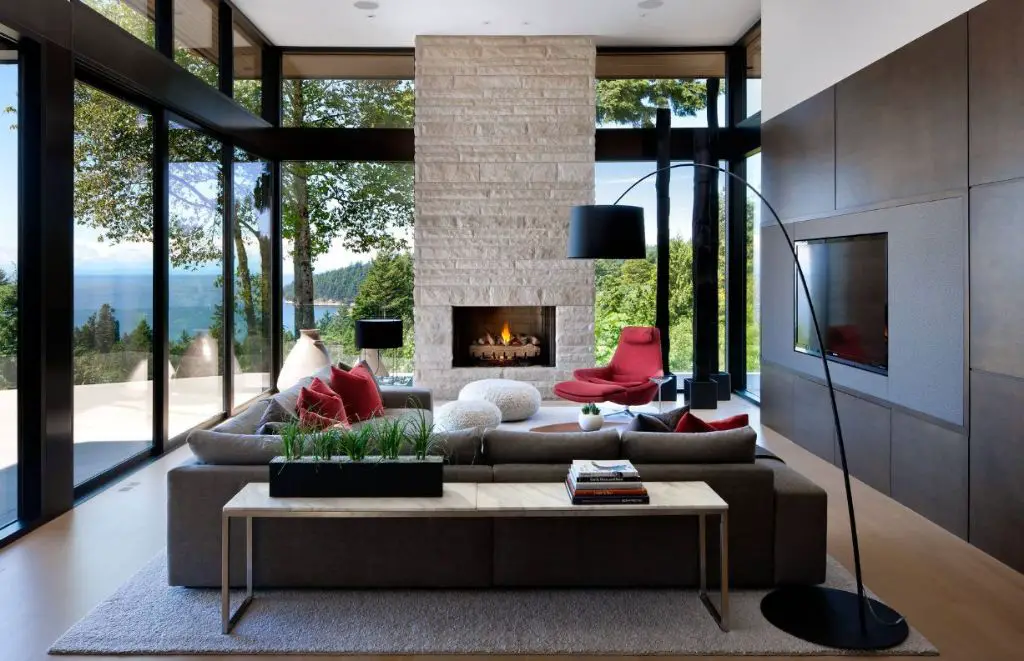 a lower console table behind a couch creates an open, spacious look in a room