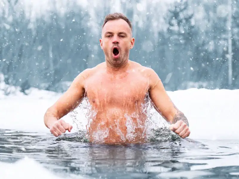 a person plunging into icy water