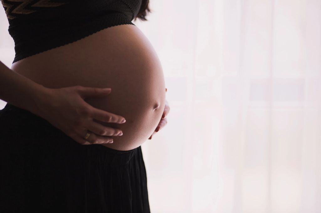 a pregnant woman deciding not to plunge