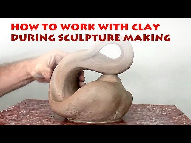 a sculptor working on a clay sculpture