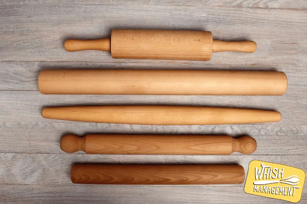 a selection of rolling pins made from different wood species