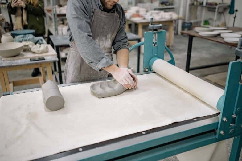 a slab roller being used to create a smooth, even concrete slab