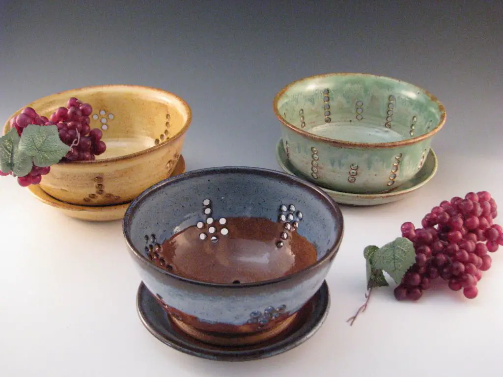 a variety of ceramic berry bowls