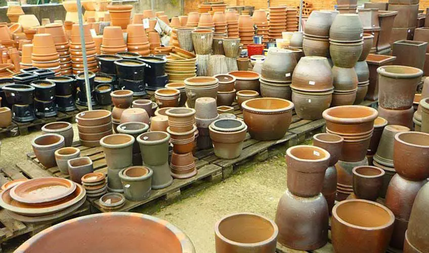 an assortment of terracotta clay pots.