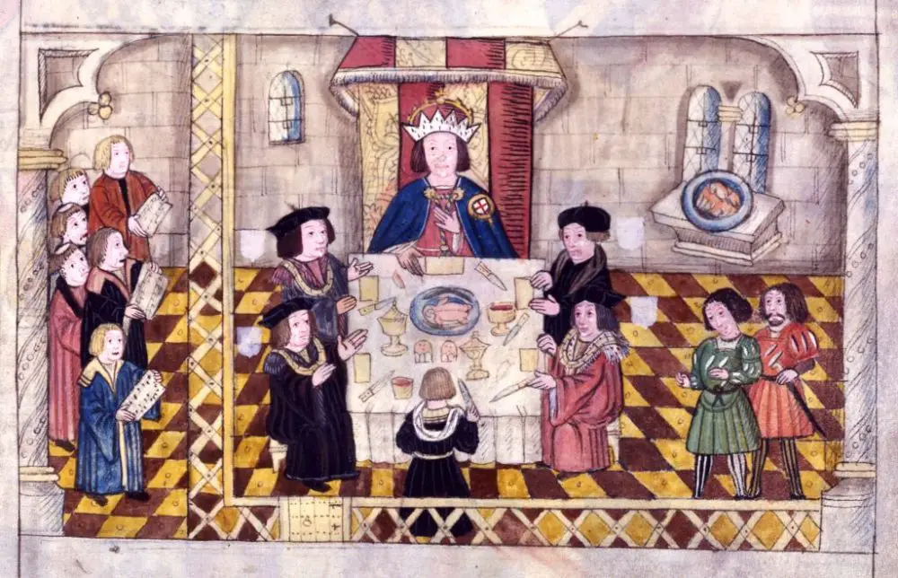 an illustration of king henry viii presiding over a feast during the 12 days of christmas in medieval england.