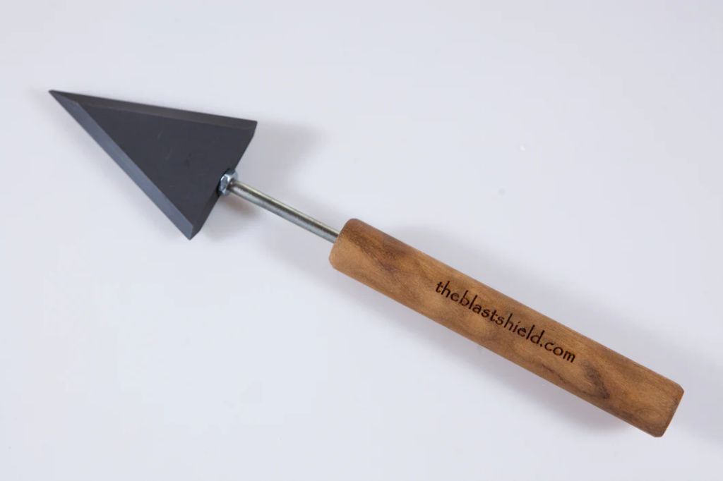 an image showing examples of triangular tool handles that fit into the hand