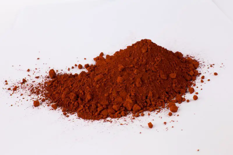 ancient use of red iron oxide pigment