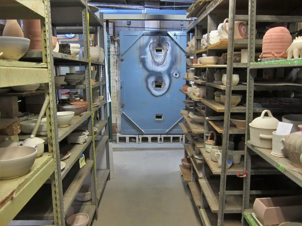 ceramic pieces inside a large gas kiln