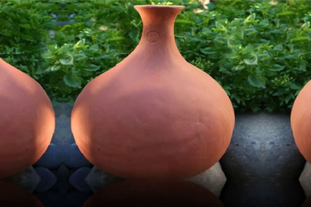 clay pots work well as ollas due to their natural porosity, slowly releasing water into the soil without overwatering.