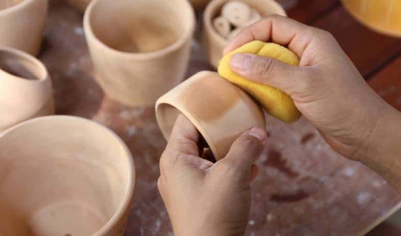 cleaning clay residue is time consuming for pottery studios.