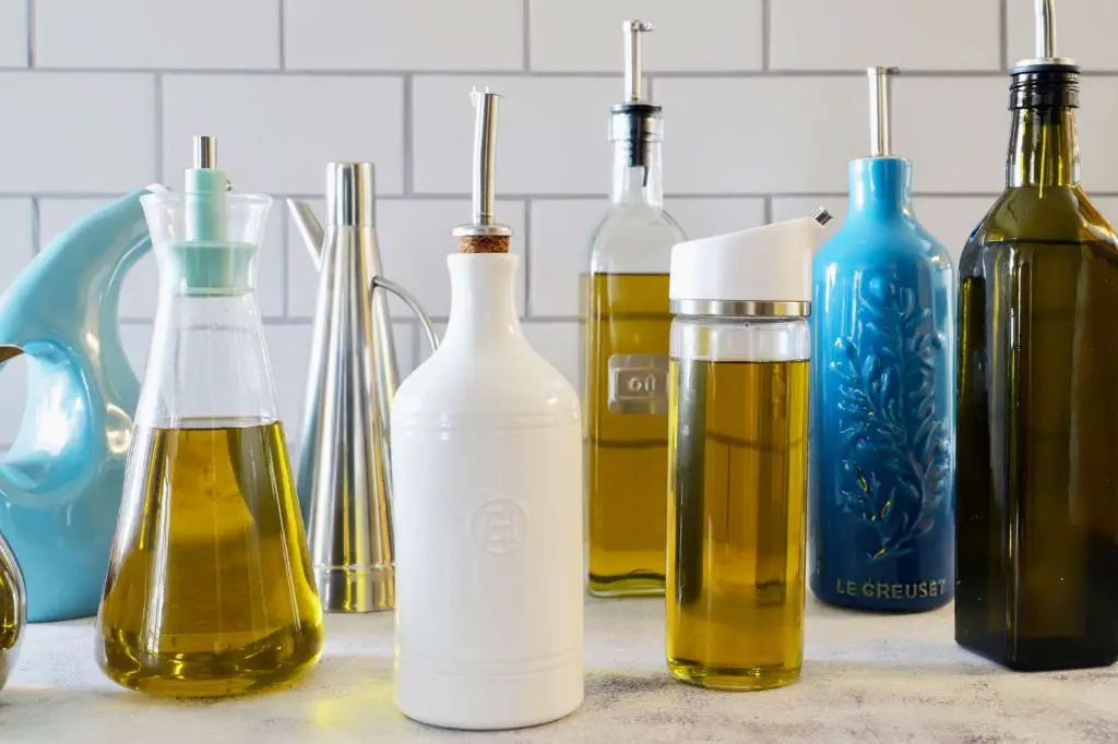 cruets allow chefs to pour olive oil in a controlled, tidy way compared to pouring straight from a bottle.