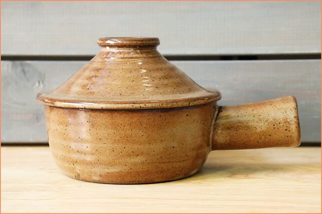 earthenware clay pieces should be properly fired and glazed to minimize potential leaching of lead, especially for serving vessels used for food.