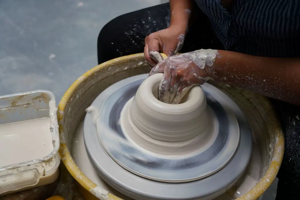 example images showing handbuilding and wheel throwing pottery techniques.