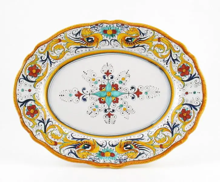 examples of italian majolica pottery with colorful hand-painted designs on a white background.
