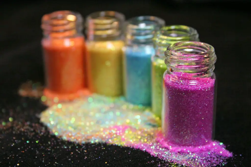 fine glitter can be mixed into air dry clay or painted over the surface to add sparkle and shine.