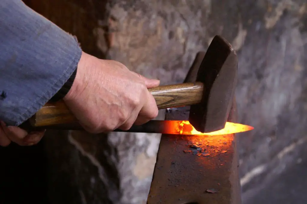 forging knives by hand requires substantial physical effort and skill.