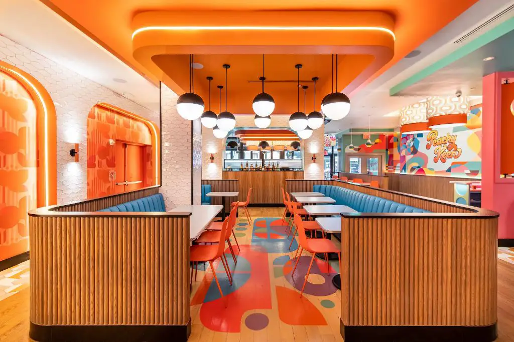 inside an over easy restaurant showing the bright, retro-inspired decor