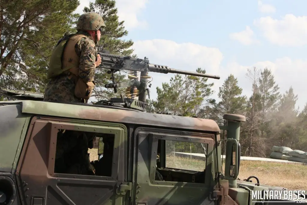 military vehicles and soldiers training at camp blanding joint training center in clay county.