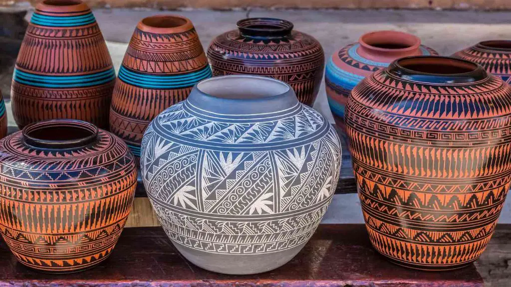 native americans primarily used hand-building techniques like coiling, pinching, and slab construction to shape pottery based on available local clays and tools.