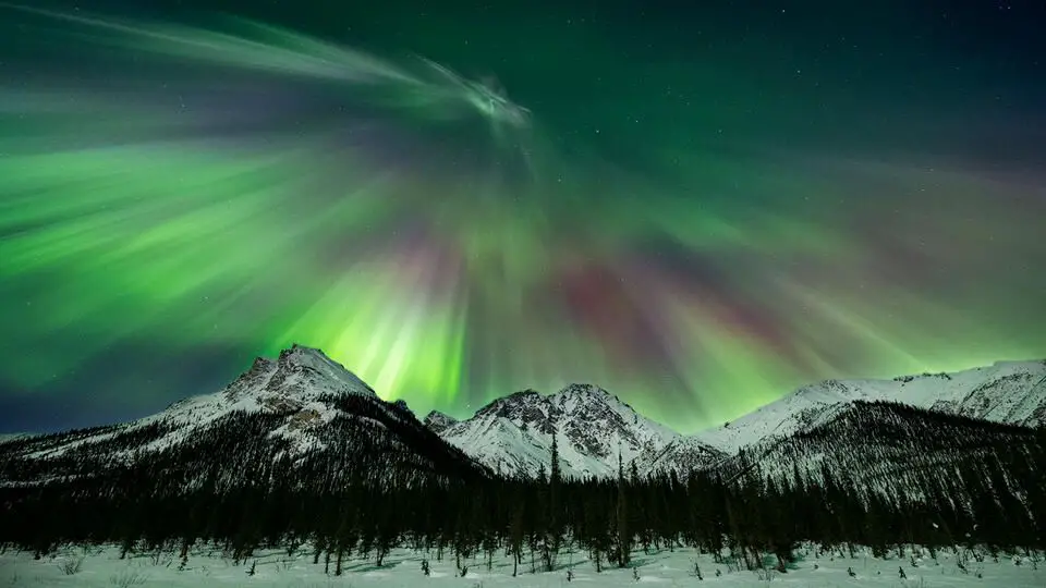 northern lights over alaska landscape