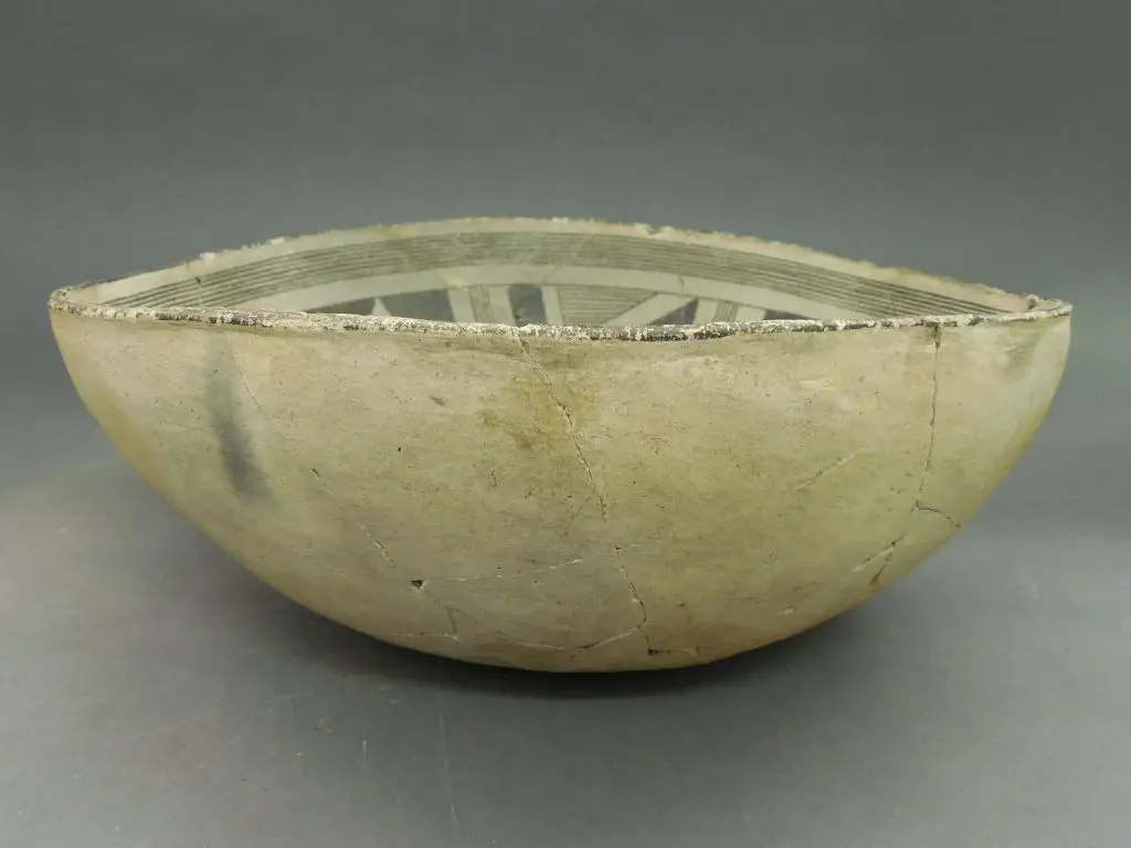 photo of mimbres bowl with hole punched in the bottom prior to firing