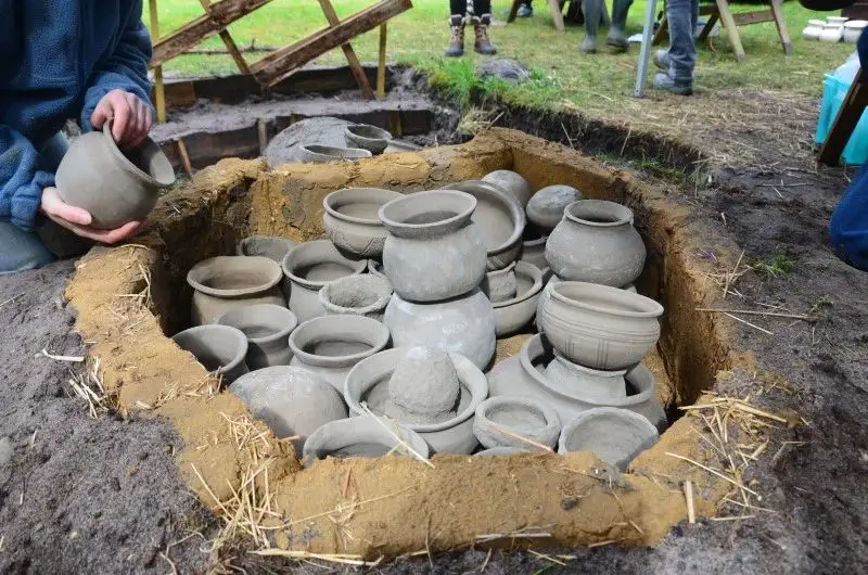 pottery ware loaded into a kiln for firing