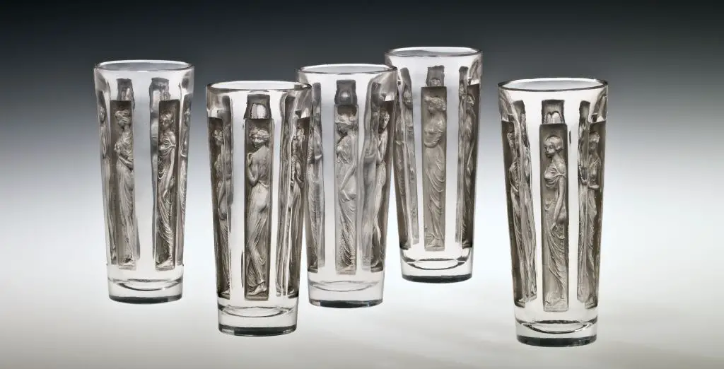 renowned french glass artist rené lalique created unique glass objects and jewelry in the early 1900s featuring innovative techniques like acid etching and lost wax casting.