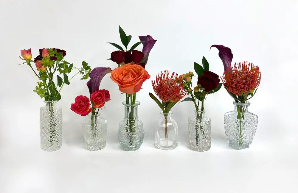 roses, carnations, chrysanthemums, lilies and tulips work well in bud vases