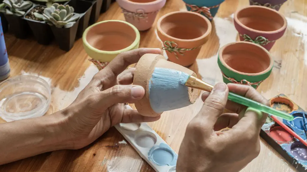 sealing clay pots creates a protective barrier for painting