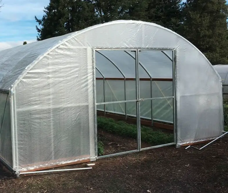 securing the end anchors is an important first step when installing wiggle wire in a greenhouse.