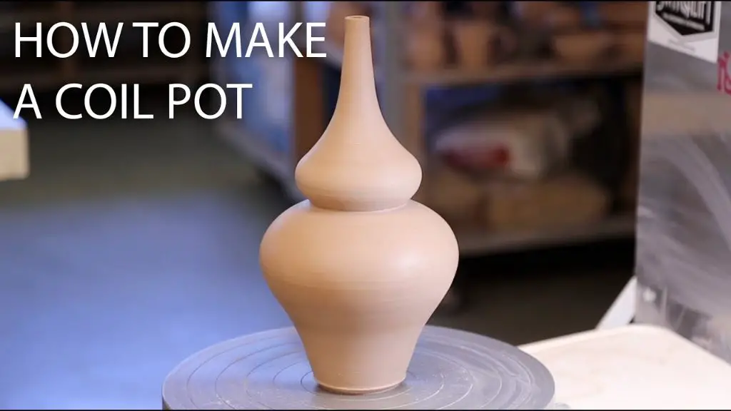 someone using a ruler to measure the thickness of a coil while constructing a coil pot