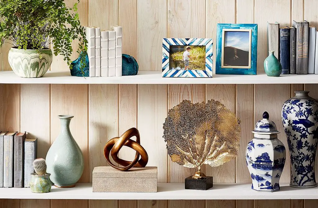 stoneware vase displayed on a shelf