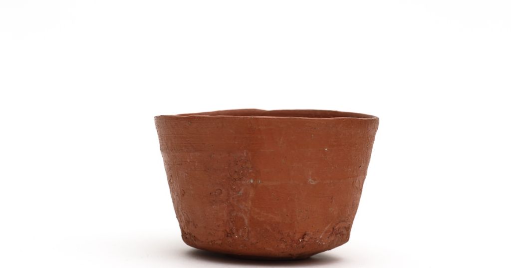 terra cotta clay contains iron oxide and minerals that cause it to turn red when fired