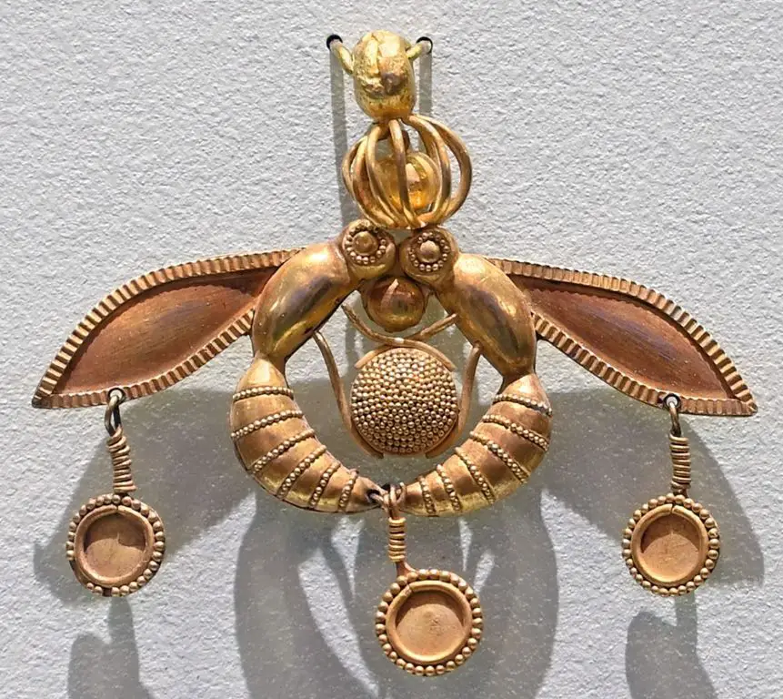 the bee pendant symbolizes productivity, community, and the sweetness of life