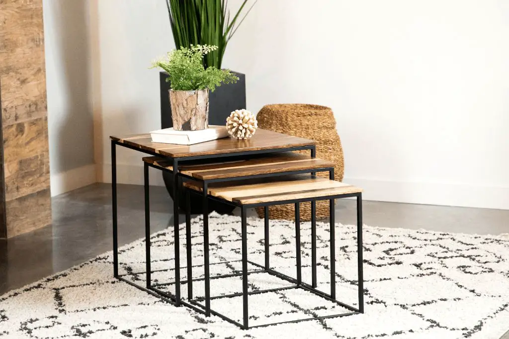 the intended use of a side table, like storage or display, helps determine the optimal size.