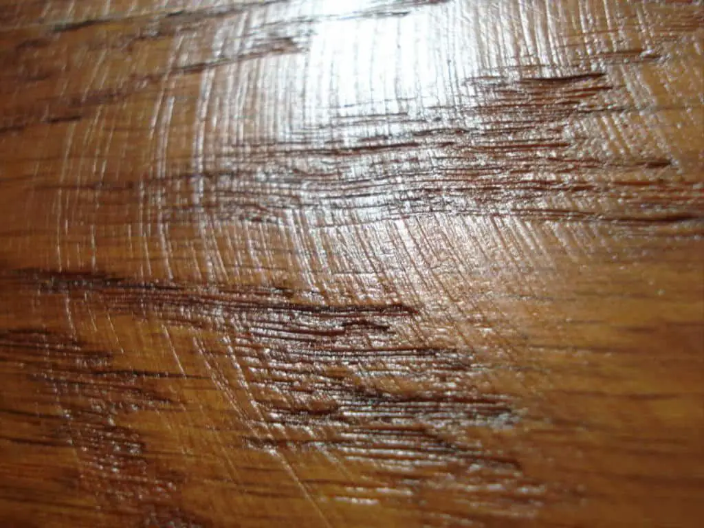 using proper sanding techniques prevents swirl marks on the wood surface.