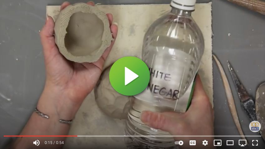 vinegar being added to clay slip