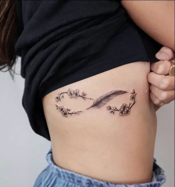 Infinity feather tattoo