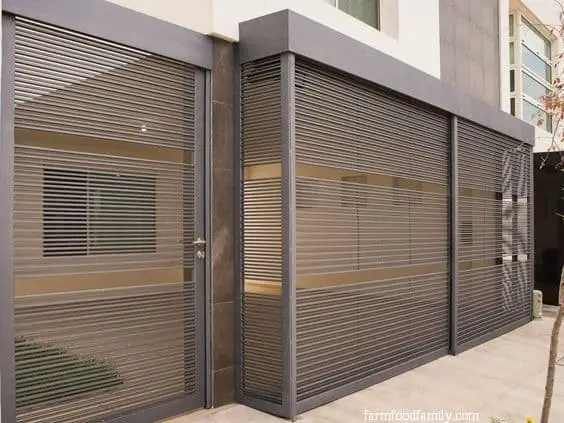 Rollup metal screen driveway gate