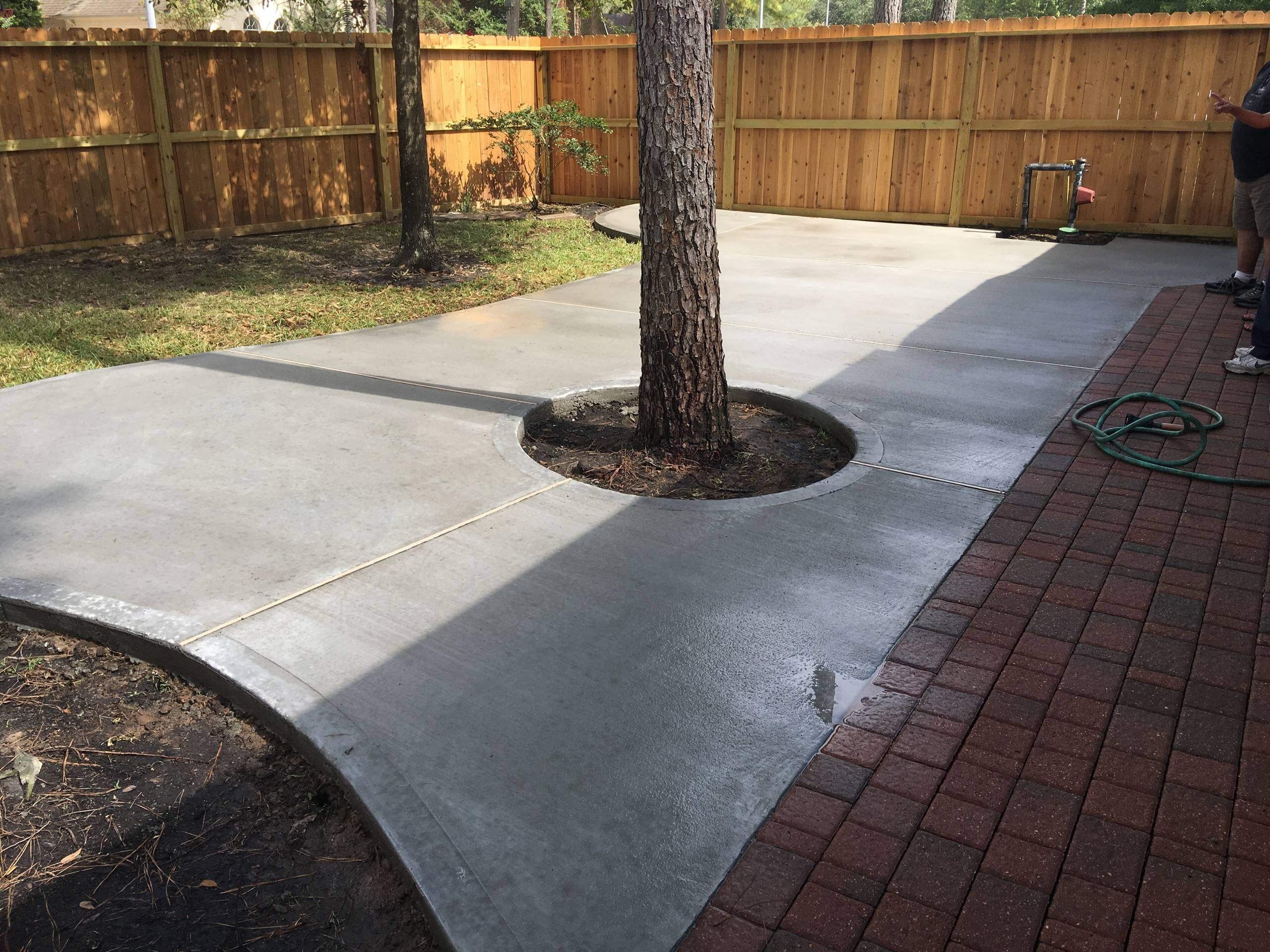 #17. Mid-sized traditional backyard concrete patio