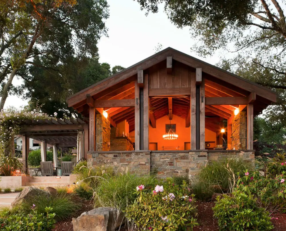 #23. Wooden Backyard Pavilion with a Brick Paver Patio