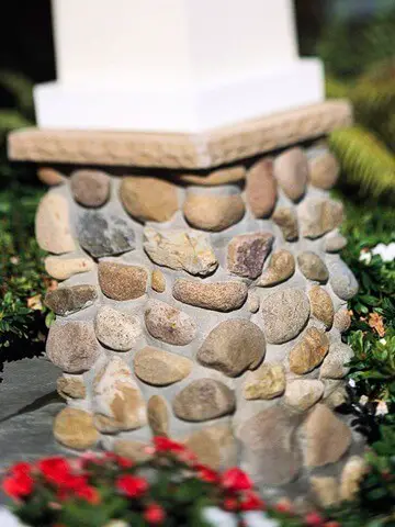 Dressing up exterior features such as concrete foundations, column footings with stone veneer