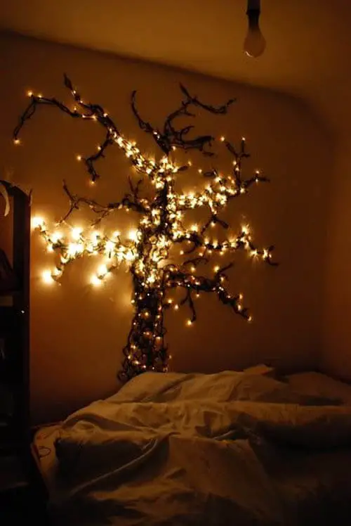 Wall tree with mounted lights in bedroom