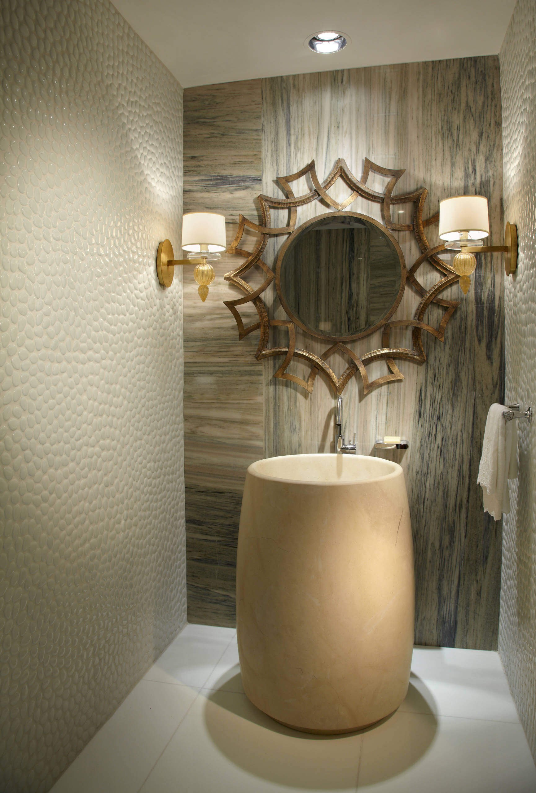 #1. Pedestal sink and beige walls