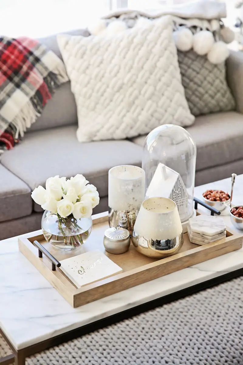 #8. Wooden tray with gold candle holder